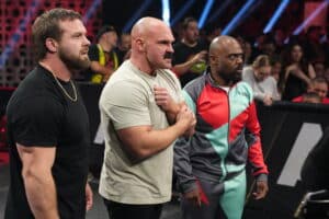 FTR and Stokely Hathaway look on